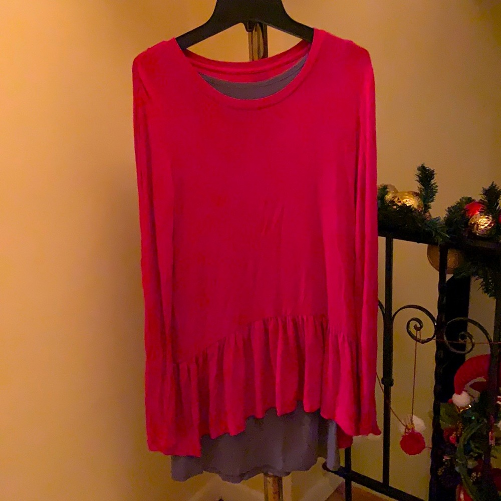 Logo layers, pink tunic peplum top with tank top.
